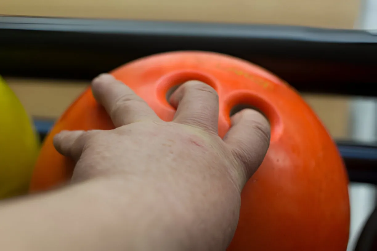 Why do Bowlers Blow into Thumb Hole? Understanding the Phenomenon